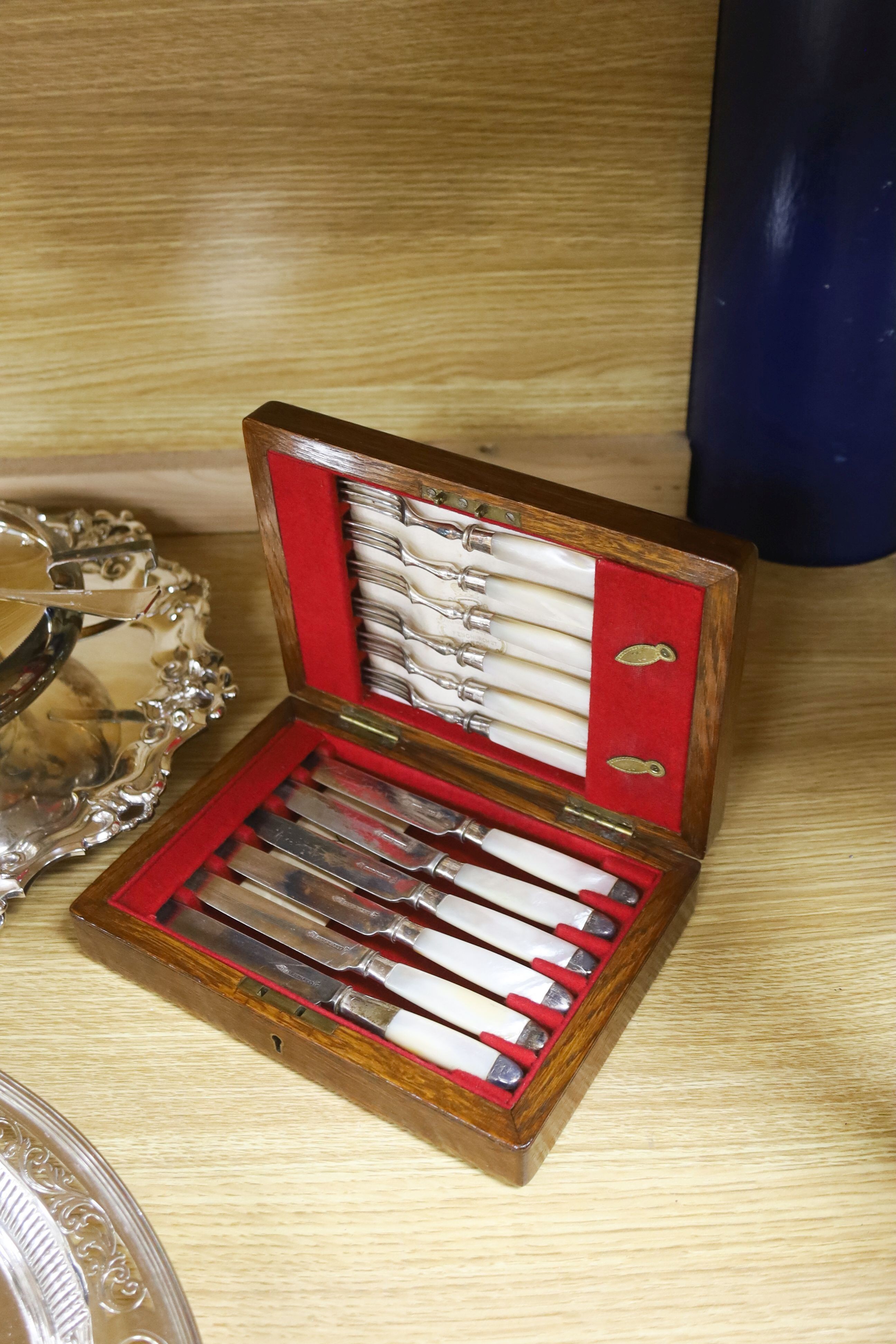 A Victorian cut glass and electroplate biscuit box and other plated wares
